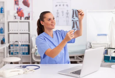 medical-nurse-holding-patient-radiography-hospital-office-radiologist-medical-uniform-holding-looking-x-ray-examination-bone-practitioner-analyze-diagnosis_482257- medical-nurse-holding-patient-radiography-hospital-office-radiologist-medical-uniform-holding-looking-x-ray-examination-bone-practitioner-analyze-diagnosis_482257-