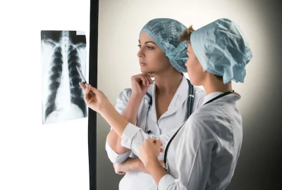 two-attractive-young-doctors-looking-x-ray-results_155003-12792 two-attractive-young-doctors-looking-x-ray-results_155003-12792